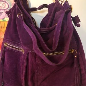 Beautiful purple suede hobo by Sorial.